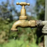Wasserhahn verkleiden